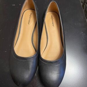Women’s black flats.